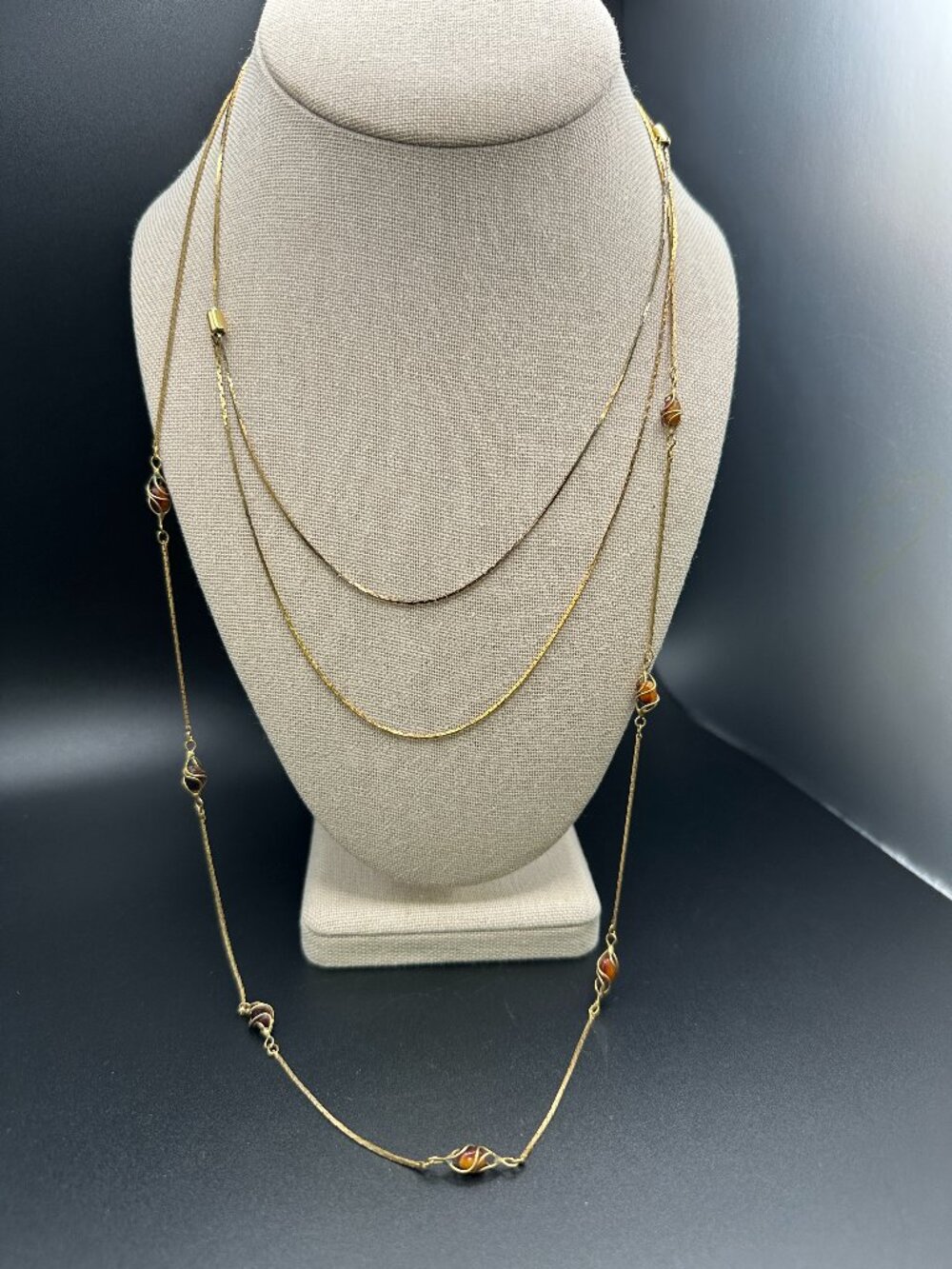 Lot of 2 Long Gold Tone Necklaces Brown Swirl Glass Beads Layered Station Chain